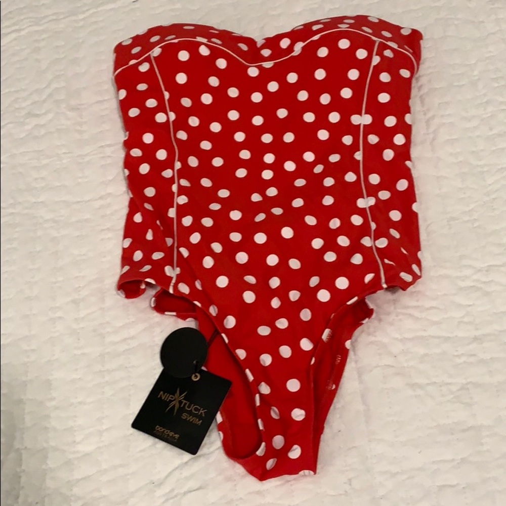 Red and white polka dot one piece swimsuit